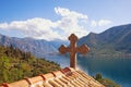 Cross of chapel in Perast town over the Bay of Kotor, Monteneg Royalty Free Stock Photo