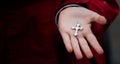 Cross in child hands Royalty Free Stock Photo