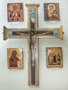 Cross with Christ and four icons