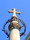 Cross on a column in Santa Maria del Fiore Square, in Florence, Tuscany, Italy