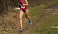 Cross Country runner racing in the woods