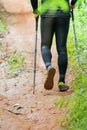 Cross country runner,Trail running in the forest,uphill in autumn trail of mud and stones,In the north of Thailand Royalty Free Stock Photo