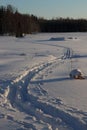 Cross country ski tracks in deep snow at sunset Royalty Free Stock Photo