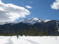 Cross Country Skier with Snowy Peak Royalty Free Stock Photo