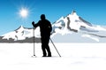 Cross-country skier on snowy plain under mountains Royalty Free Stock Photo