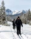 Cross country skiers with Idaho mountain backdrop