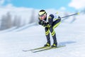 Cross-country skiier in downhill position