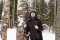 Young man cross-country skiing in the forest Royalty Free Stock Photo