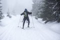 Cross-country skiing in the mountains in winter