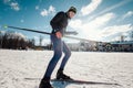 Cross-country skiing woman doing classic nordic cross country skiing in trail tracks in snow covered forest Royalty Free Stock Photo