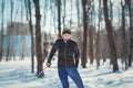 Cross-country skiing woman doing classic nordic cross country skiing in trail tracks in snow covered forest Royalty Free Stock Photo