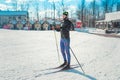 Cross-country skiing woman doing classic nordic cross country skiing in trail tracks in snow covered forest Royalty Free Stock Photo