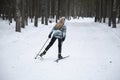 Cross country Skilling. A skier goes skiing on the ski track