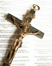 Cross With Crucified Jesus Christ On Open Bible