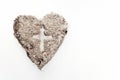 Cross or crucifix in heart symbol made of ash, lent and Ash Wednesday concept Royalty Free Stock Photo