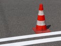 The cross-decorated pedestrian crossing with the still not dried out red. Restriction of traffic by road signs. Update road pedest Royalty Free Stock Photo