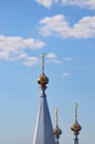 Cross on the dome against the blue sky. Religion