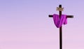 Cross draped in purple represents Lenten Season