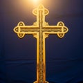 The cross features intricate patterns along its surface, highlighte Royalty Free Stock Photo