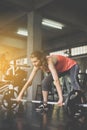 Cross fit body and muscular lifting barbell weights in the gym,Sport woman doing exercises training Royalty Free Stock Photo