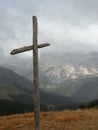 Cross in the fog in Dolomiti mountains Royalty Free Stock Photo