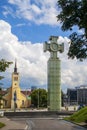 Monument on Freedom Square and church of St. John in Tallin Royalty Free Stock Photo
