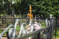 A cross on a fresh grave in a Christian cemetery. Everlasting memory Royalty Free Stock Photo