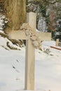 Cross ornament in the snow Royalty Free Stock Photo