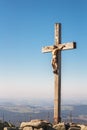 Cross with Jesus Christ on Lusen hill summit.