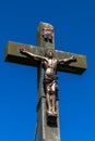Cross of Jesus Christ on sky background. Close up