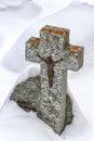 Cross with Jesus on tombstone in cemetery Royalty Free Stock Photo