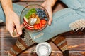 Cross legged person having breakfast on the floor Royalty Free Stock Photo