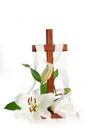 Cross with lilies isolated on white background. Spring background. Easter, baptism or first communion concept