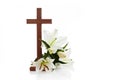 Cross with lilies isolated on white background for decorative design. Spring background. Easter card. Royalty Free Stock Photo