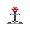 The cross of the Lord Jesus Christ, an open Bible and a flame of fire are a symbol of the Holy Spirit. Royalty Free Stock Photo