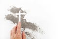 Cross made of ashes, Ash Wednesday, Lent season abstract background. Royalty Free Stock Photo