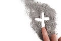 Cross made of ashes, Ash Wednesday, Lent season abstract background Royalty Free Stock Photo