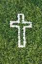 Cross made from daisy flowers