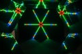 Cross made of lights with green and red elements. Royalty Free Stock Photo