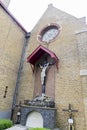 Cross and memorial slab on Sint Pieters Bandenkerk Dudzele church