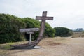 Cross monument with trees in the background, Menez Ham, Spain