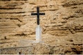 Stone Cross on background sandstone mountain Royalty Free Stock Photo