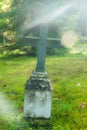 Cross at old beautiful semetery in Finland