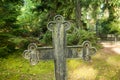 Cross at old beautiful semetery in Finland