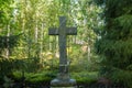 Cross at old beautiful semetery in Finland