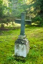 Cross at old beautiful semetery in Finland