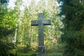 Cross at old beautiful semetery in Finland