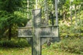 Cross at old beautiful semetery in Finland
