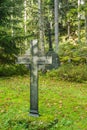 Cross at old beautiful semetery in Finland