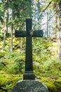 Cross at old beautiful semetery in Finland